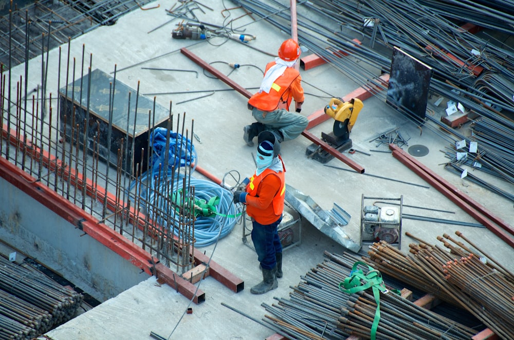 AHM crew reviewing plans on a construction site